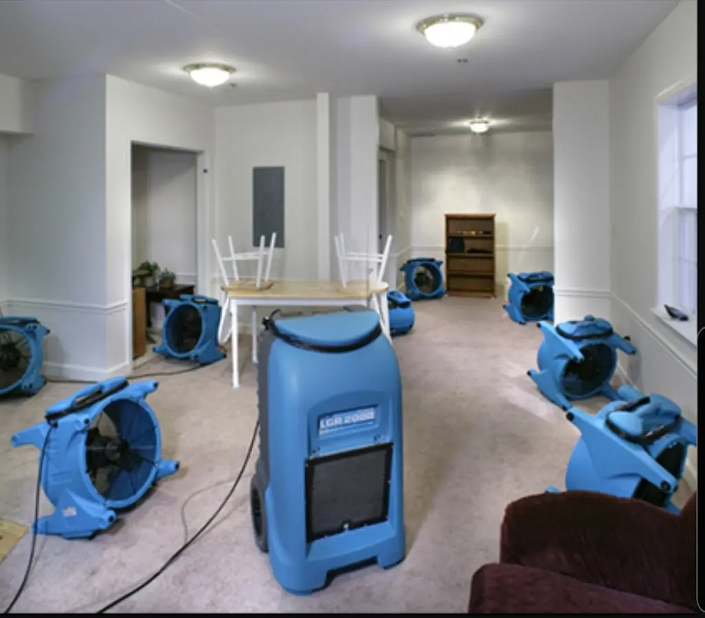 Air movers and dehumidifier setup for Water Damage Restoration in Depew